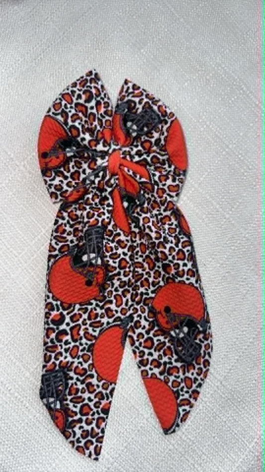 Orange Leopard Football